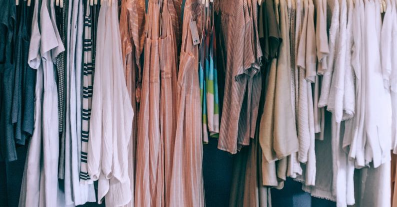 Organic Clothing - Collection of female clothes on rack in boutique