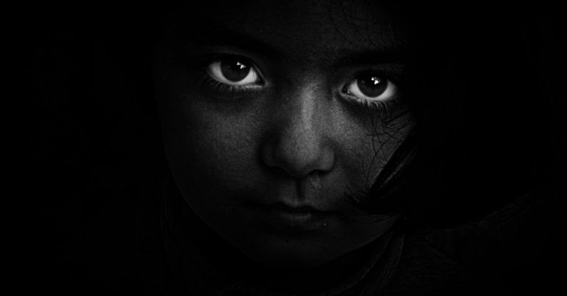 Hidden Fees - Grayscale Photography of Girl's Face
