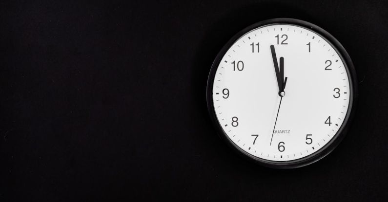 Last-Minute Shopping - Black Round Analog Wall Clock On Black Background