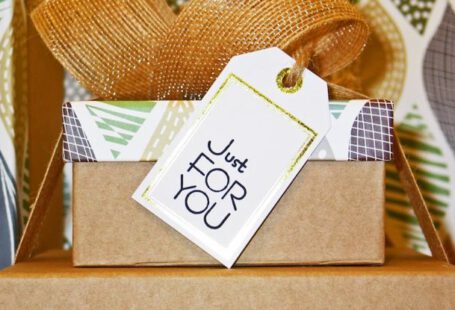 Gift Cards - Close-up Photo of Gift Boxes with Greeting Card